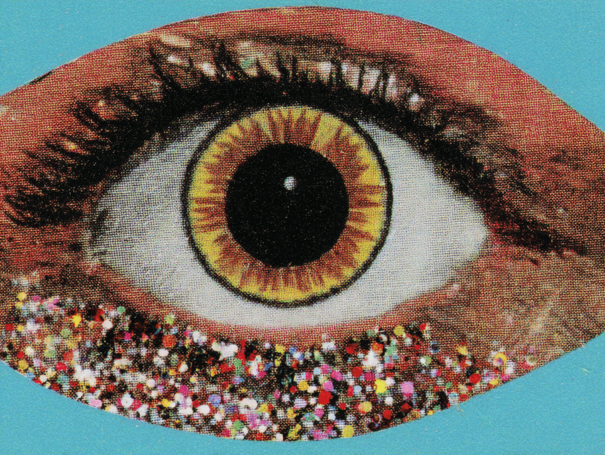 An eye adorned with colorful glitter beneath it, symbolizing emotional complexity and human sensitivity.